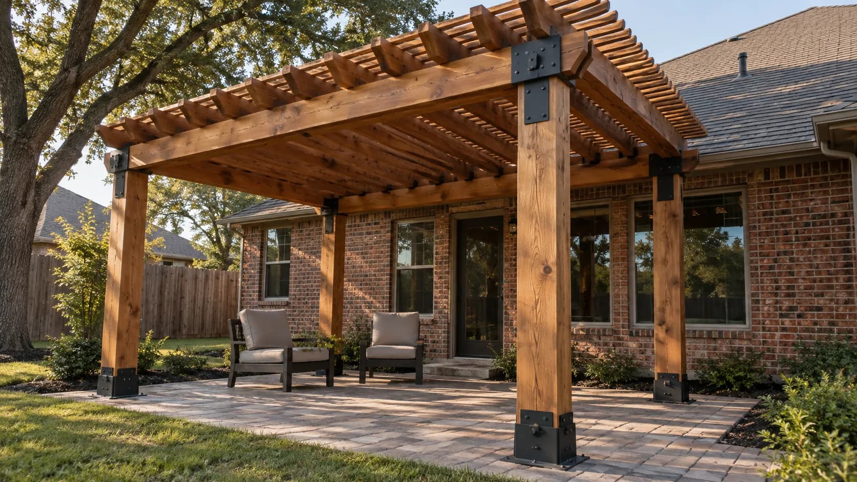 A cedar pergola with substantial beams and black brackets.